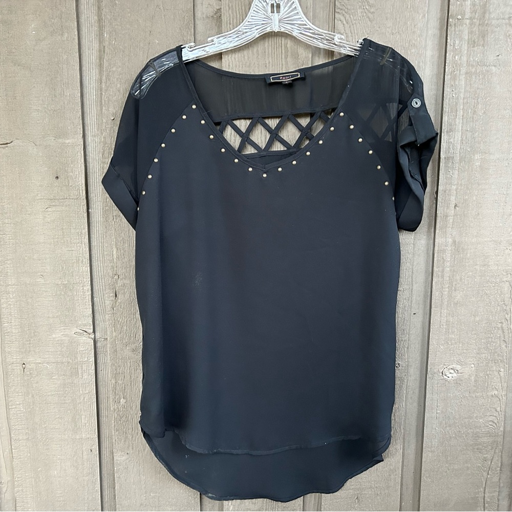 Black top with sheer top part with studs and cross cross back